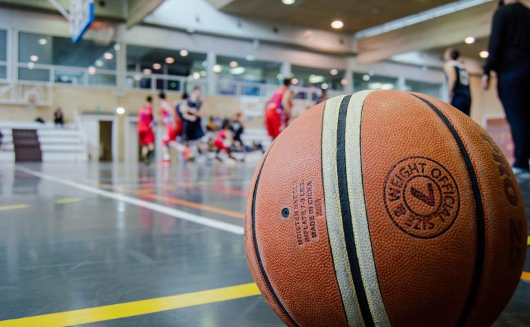 Basketball on a court at a booster club fundraising event